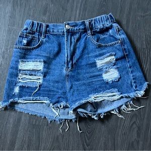 Blue distressed denim shorts